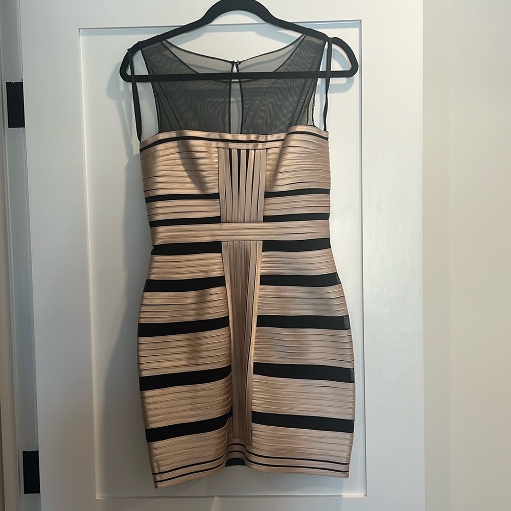 BCBGMaxazria bandage dress in champagne satin and black mesh